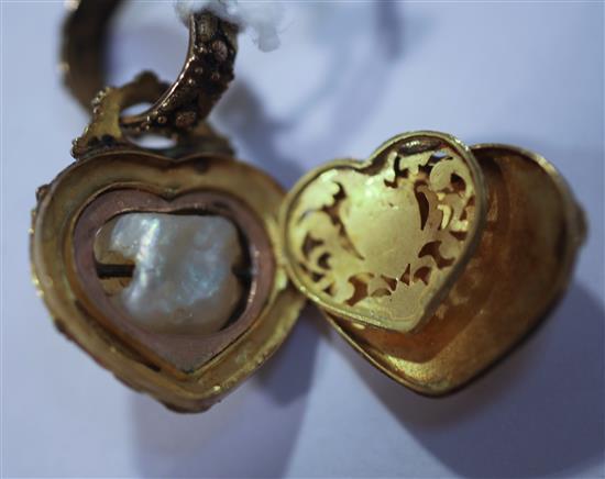 A 19th century three colour gold, baroque pearl and rose cut diamond set heart shaped pendant locket, 1.5in.